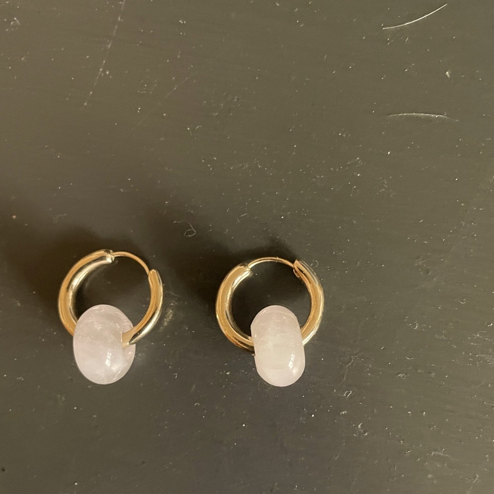 Gold hoops with rose quartz.